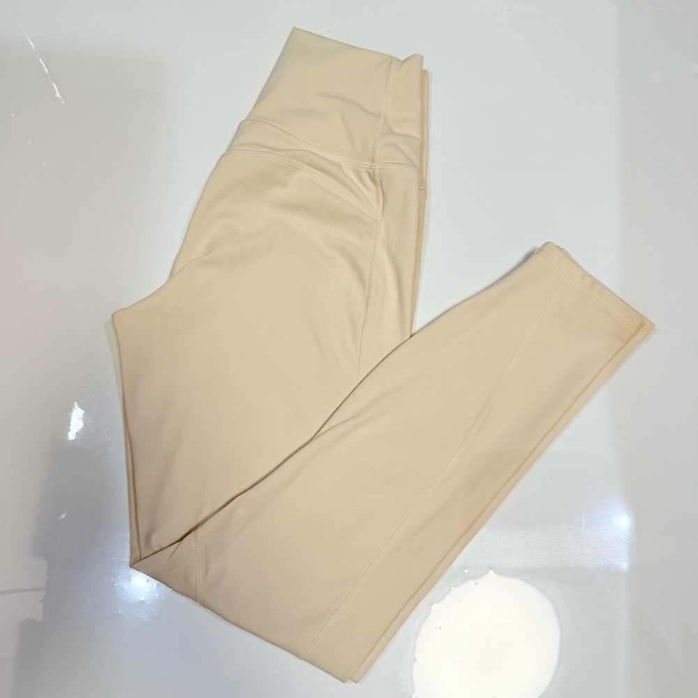 Fabletics PureLuxe High-Waisted 7/8 Leggings - Cream / Champagne - XXS